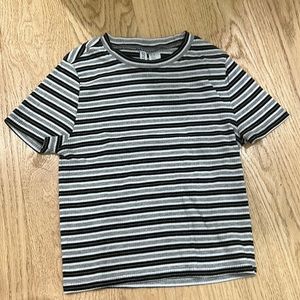 This is a H&M shirt. The size is a medium and it has never been worn.